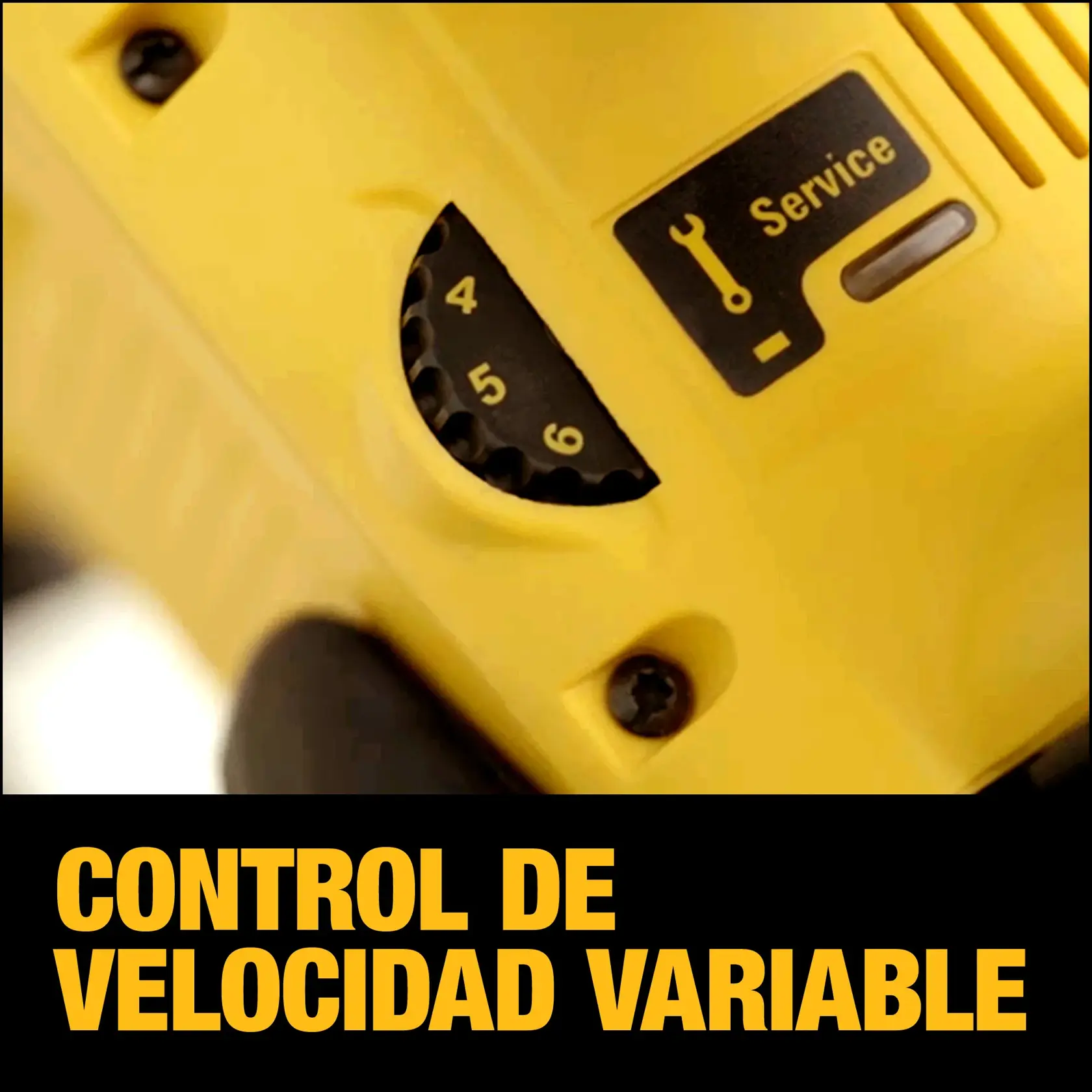 Primer plano de herramienta DEWALT con dial de control de velocidad variable e indicador de servicio.
